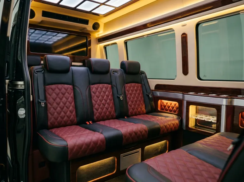 Sprinter interior — black and red leather rear bench seating